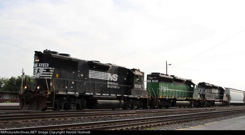 NS 5238 leads train P02 into the yard